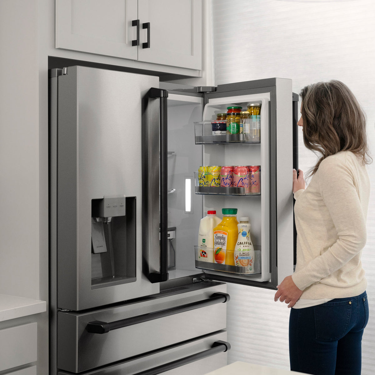 ZLINE Autograph Edition 36 in. 21.6 cu. ft. Counter-Depth French Door Refrigerator with Water and Ice Dispenser in Fingerprint-Resistant Stainless Steel with Matte Black Traditional Handles (RFMZ-W-36-MB)